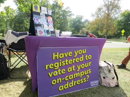 Nextgen America's tabling event asking students if they are registered to vote in Ingham County on Oct. 17, 2024 (Sarah Moore)